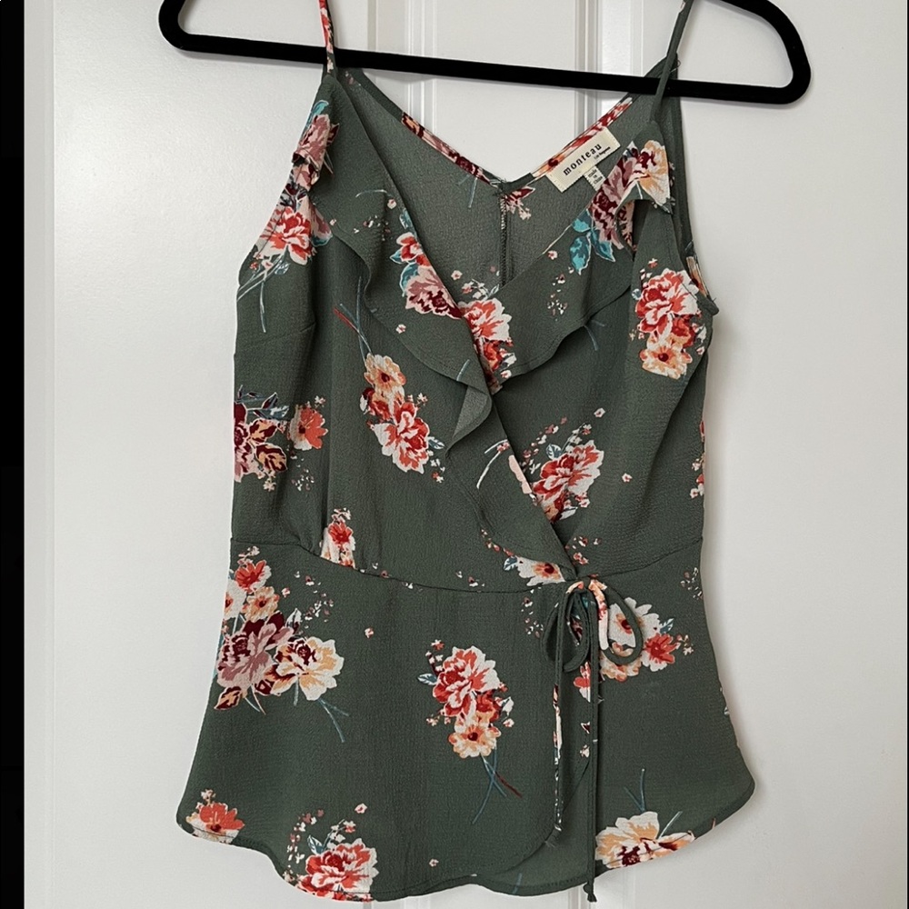 Pale green and flowered sleeveless top